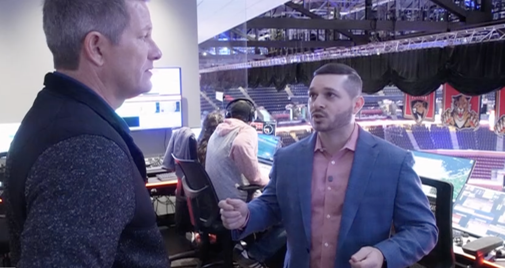 Florida Panthers Vice President, Game Entertainment and Operations Mike Masino gives Panthers 360 host Mike Trim a tour of arena control room