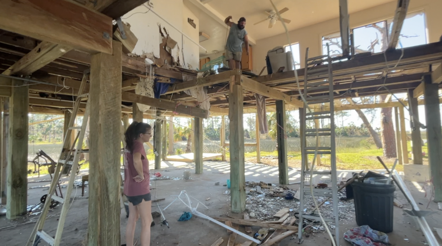 Koal and Nikki picking up the pieces in their home 