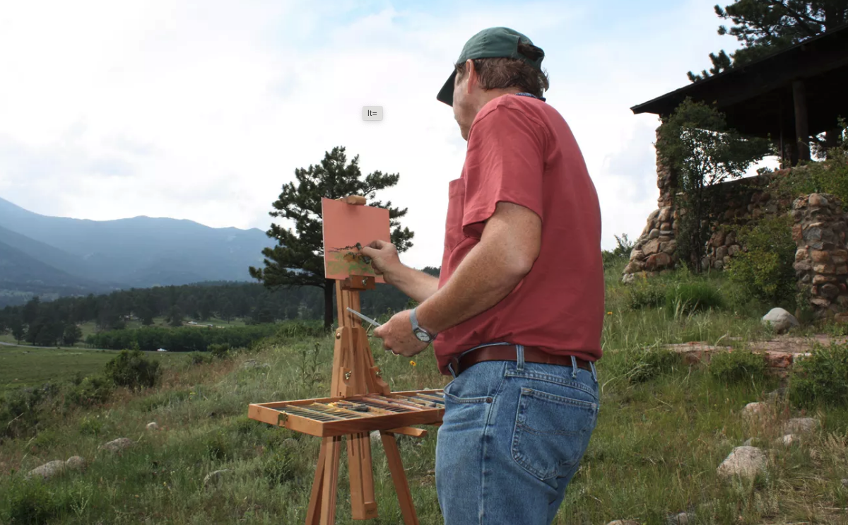 Artist-In-Residence John Hulsey is pictured while painting in Moraine Park