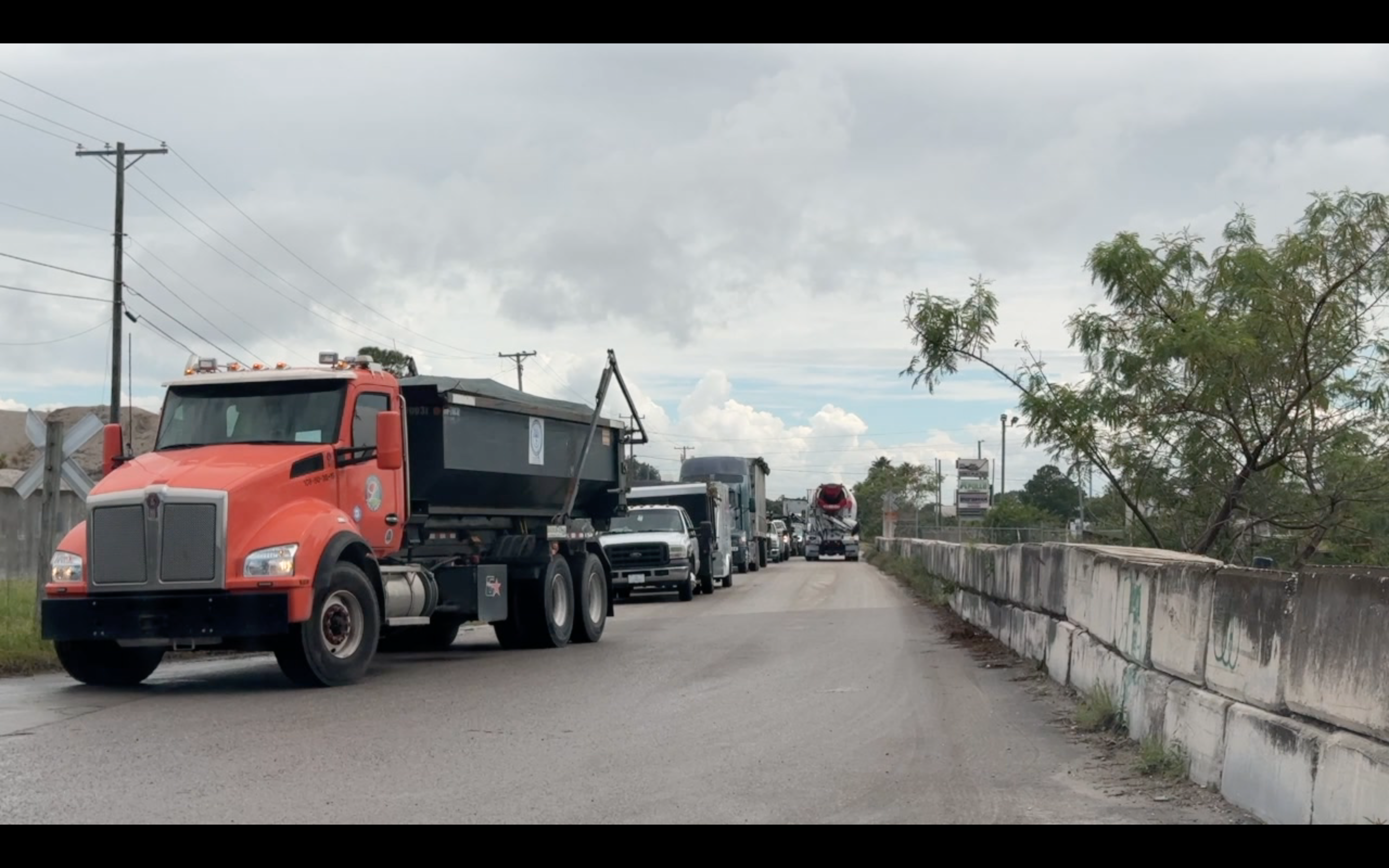 Commercial haulers lined up at Angelo’s Recycling in Largo on Tuesday