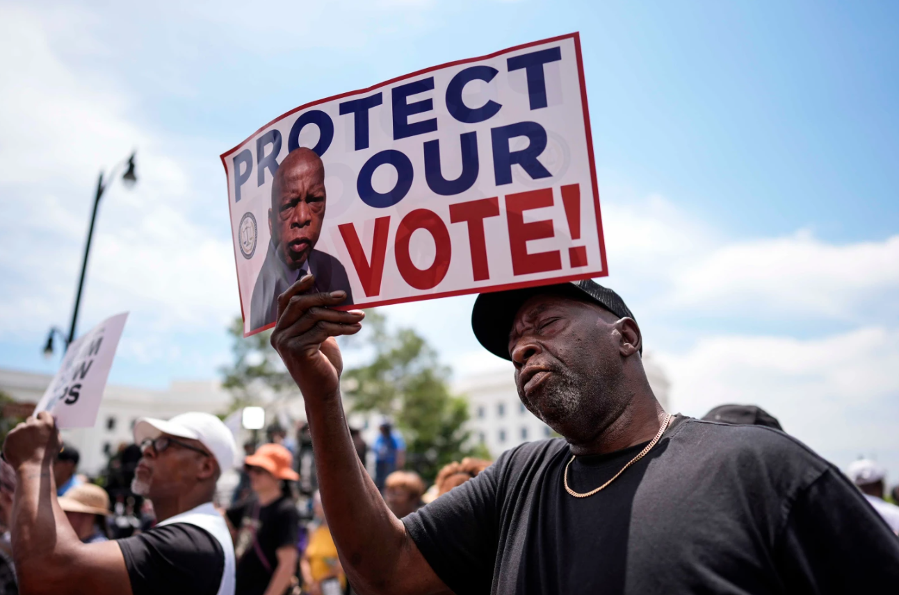 Aaron McGuire sings a spiritual song during a voting rally, Saturday, May 16, 2026, in Montgomery, Ala.