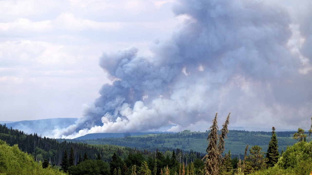 Smoke billows from the Donnie Creek wildfire burning north of Fort St. John, British Columbia, Canada.
