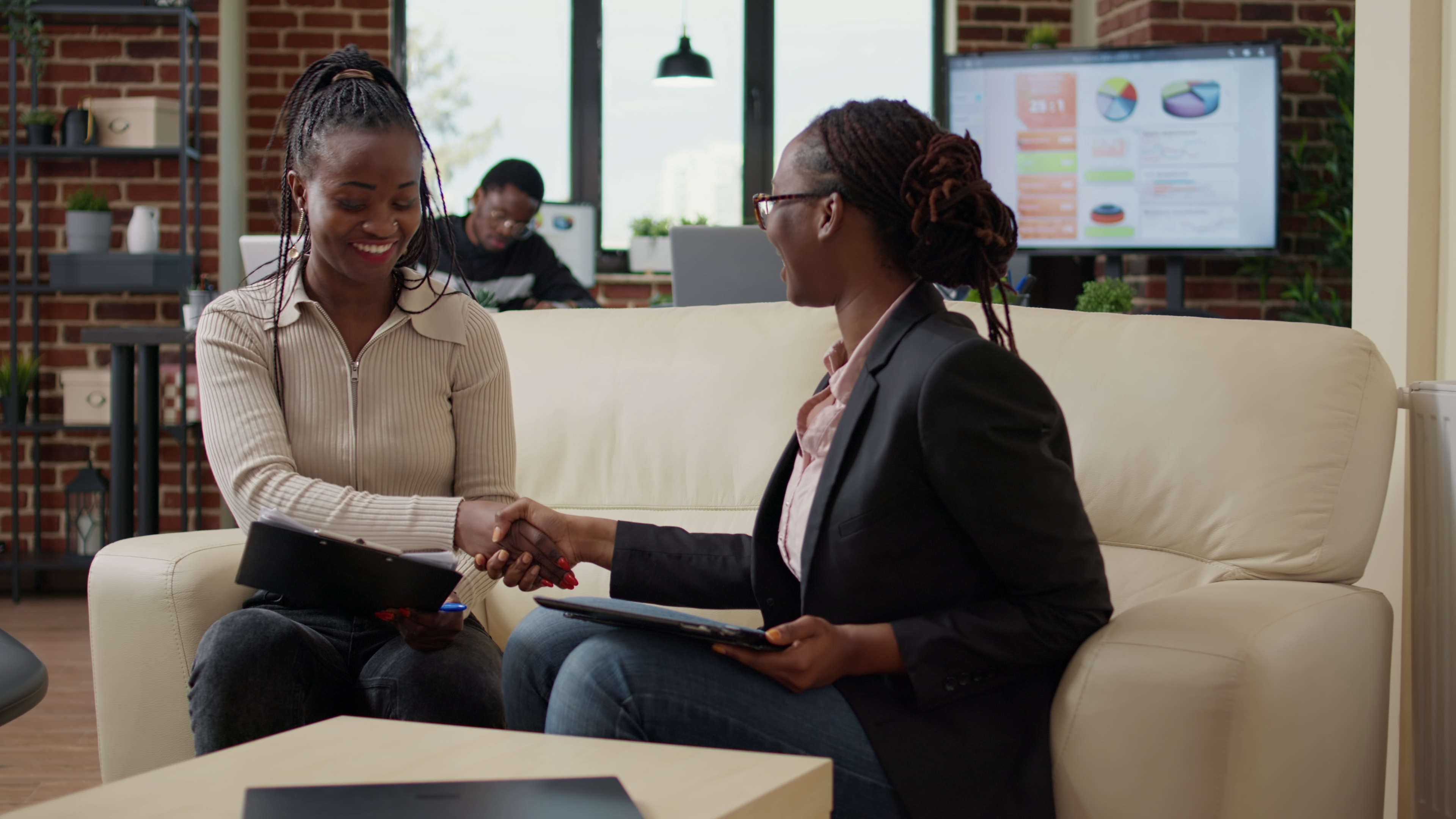 Now Hiring women shaking hands 