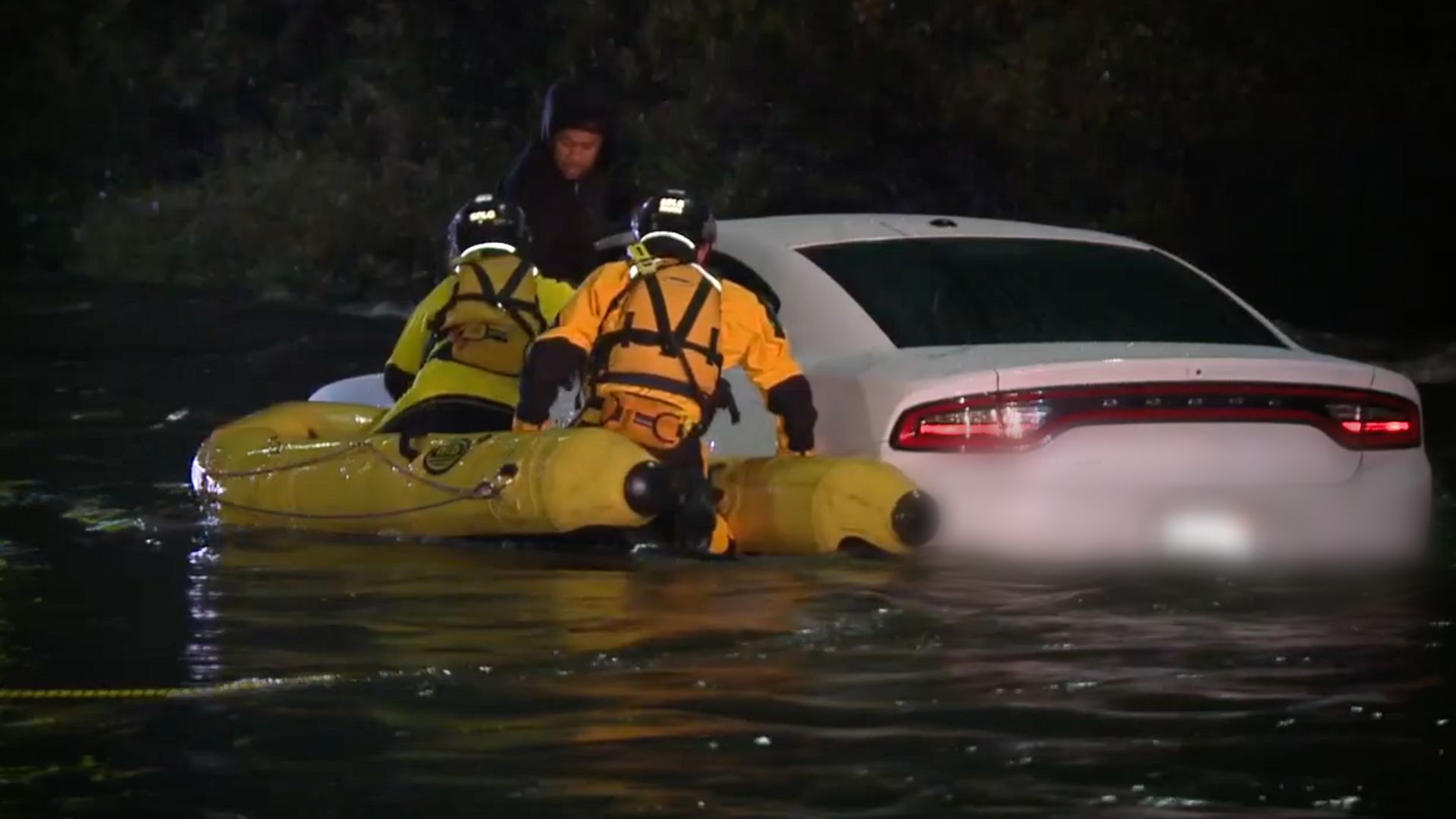 RESCUE FROM WATER WITH LICENSE PLATE BLURRED