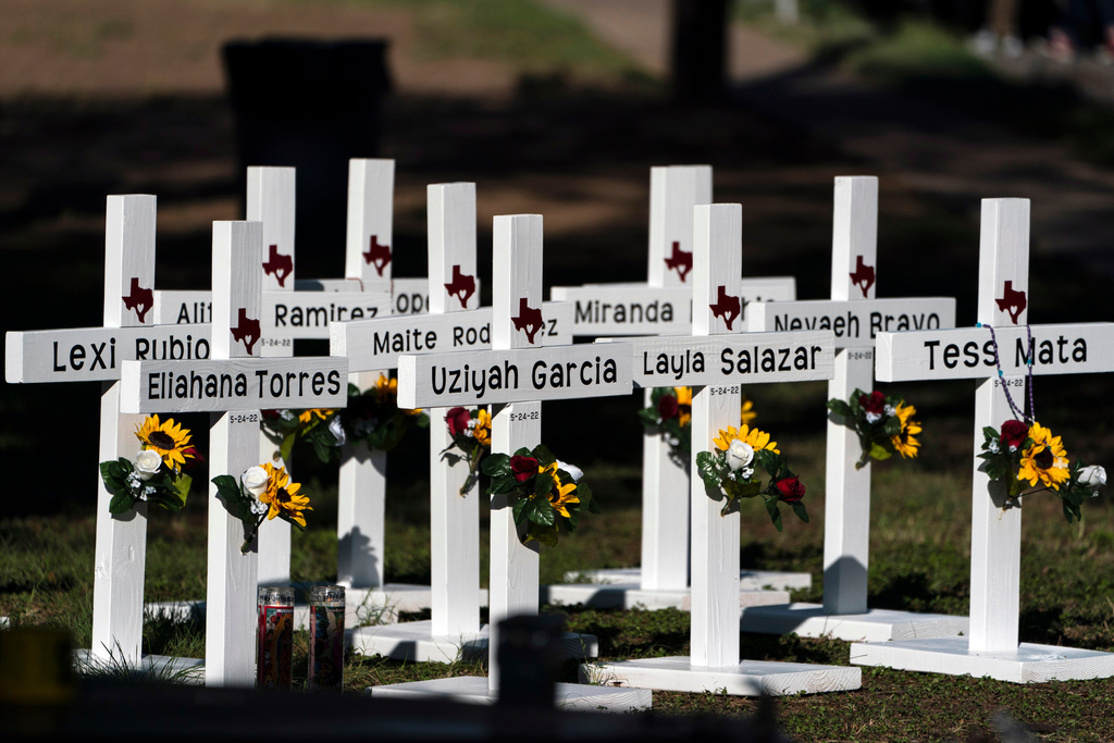 Crosses with the names of shooting victims are placed outside Robb Elementary School in Uvalde, Texas.