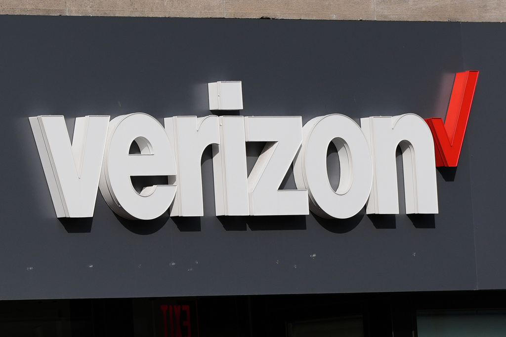 A Verizon sign is displayed on a store, Sept. 30, 2025, in Cambridge, Mass. 