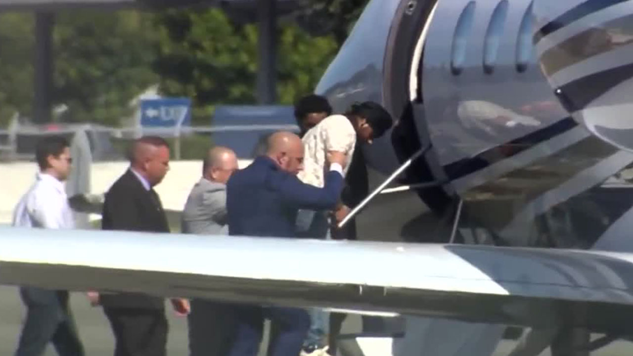 Harjinder Singh, a semi driver accused of making an illegal U-turn on Florida's Turnpike that resulted in the death of three people, was ushered onto a jet in California on Aug. 21, 2025, to be taken back to Florida to face charges.