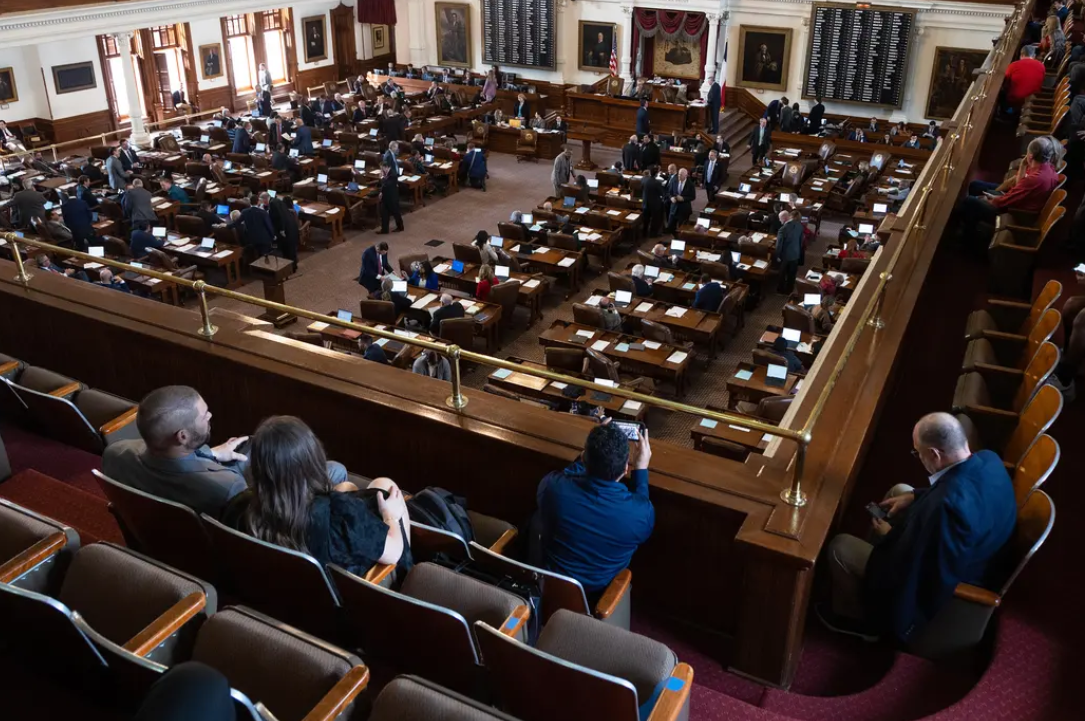 State representatives meet on the House floor at the state Capitol in Austin on Jan. 11, 2023.