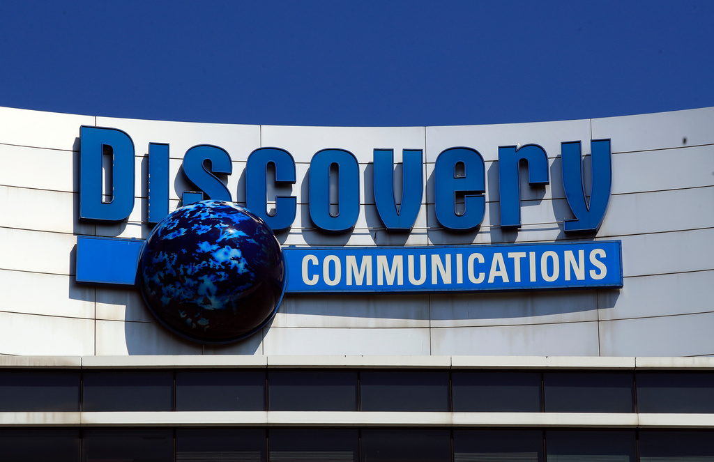 The Discovery Communications logo atop its headquarters in Silver Spring, Md, July 31, 2017. 