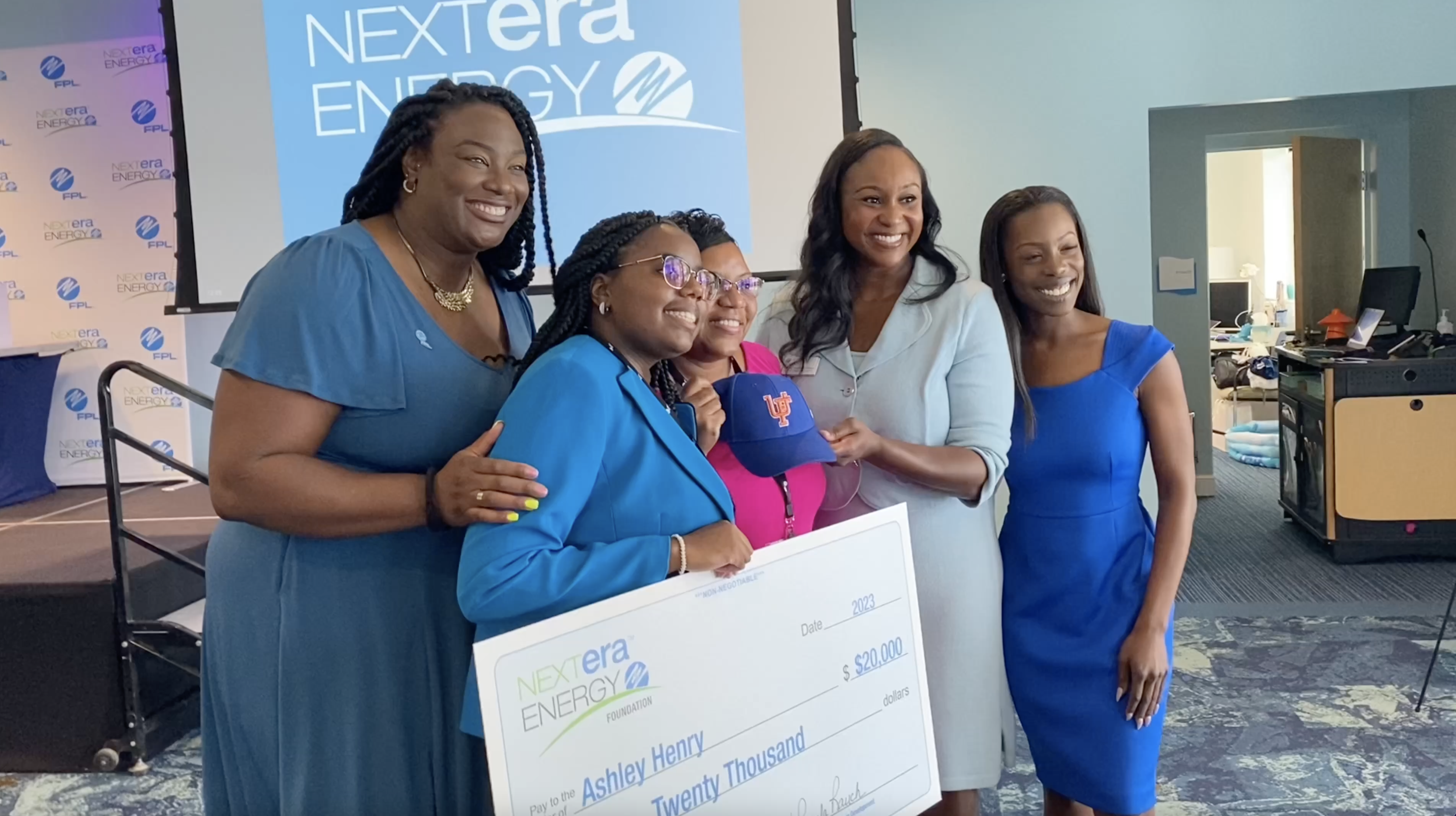 students receive scholarship from Florida Power and Light Company & NextEra Energy July 8 2023.png