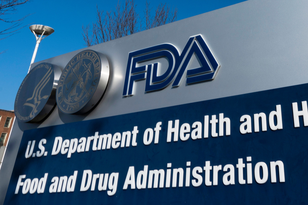FILE - A sign for the U.S. Food and Drug Administration.