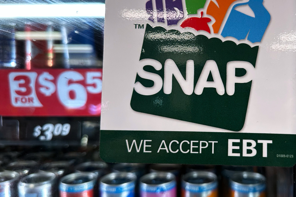 SNAP EBT information sign is displayed at a gas station in Riverwoods, Ill., Saturday, Nov. 1, 2025. 