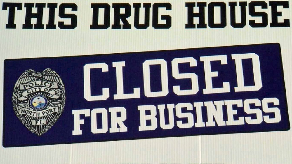 wptv-drug-house-closed-sign-.jpg