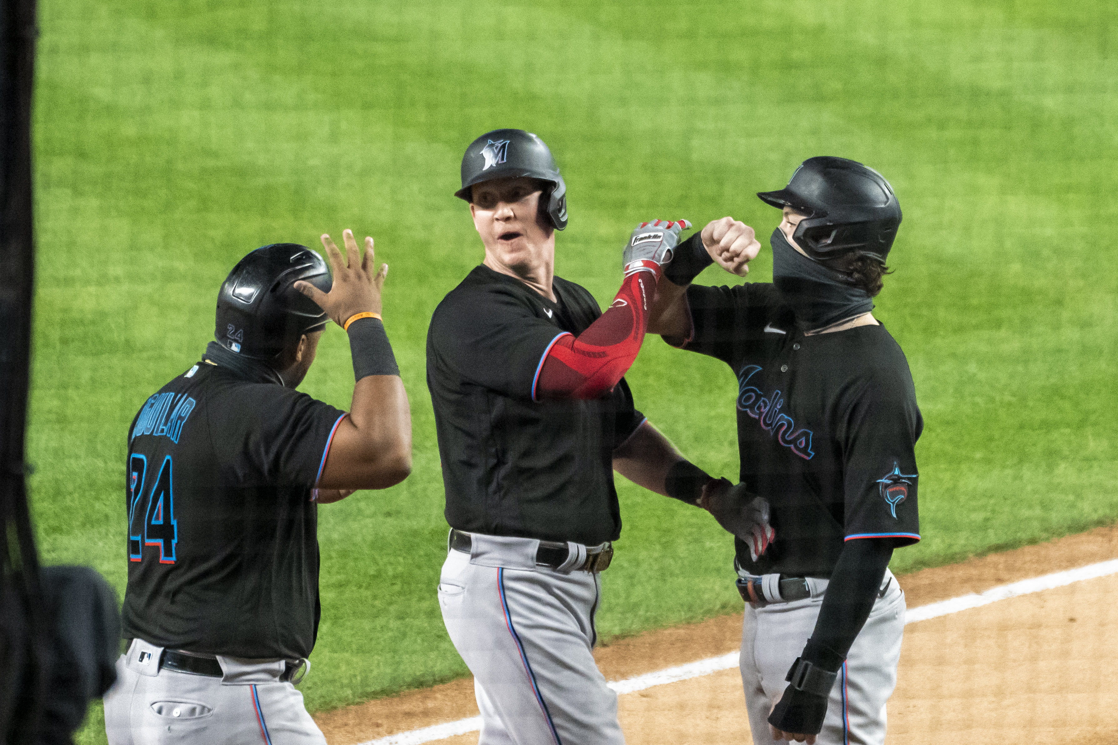 Garrett Cooper celebrates, Miami Marlins at New York Yankees, Sept. 25, 2020