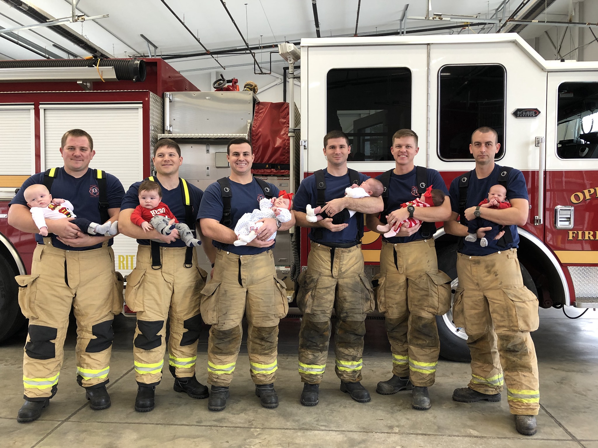 Opelika Fire Department firefighters with babies