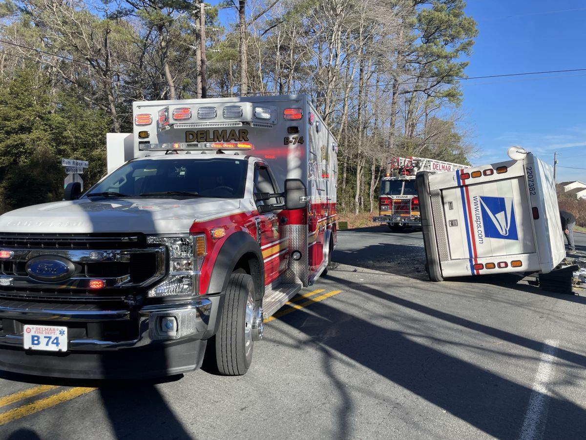 Overturned mail truck in Delmar area