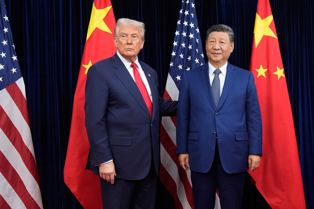 President Donald Trump, left, and Chinese President Xi Jinping pose ahead of their summit talk at Gimhae International Airport in Busan, South Korea, Oct. 30, 2025. 