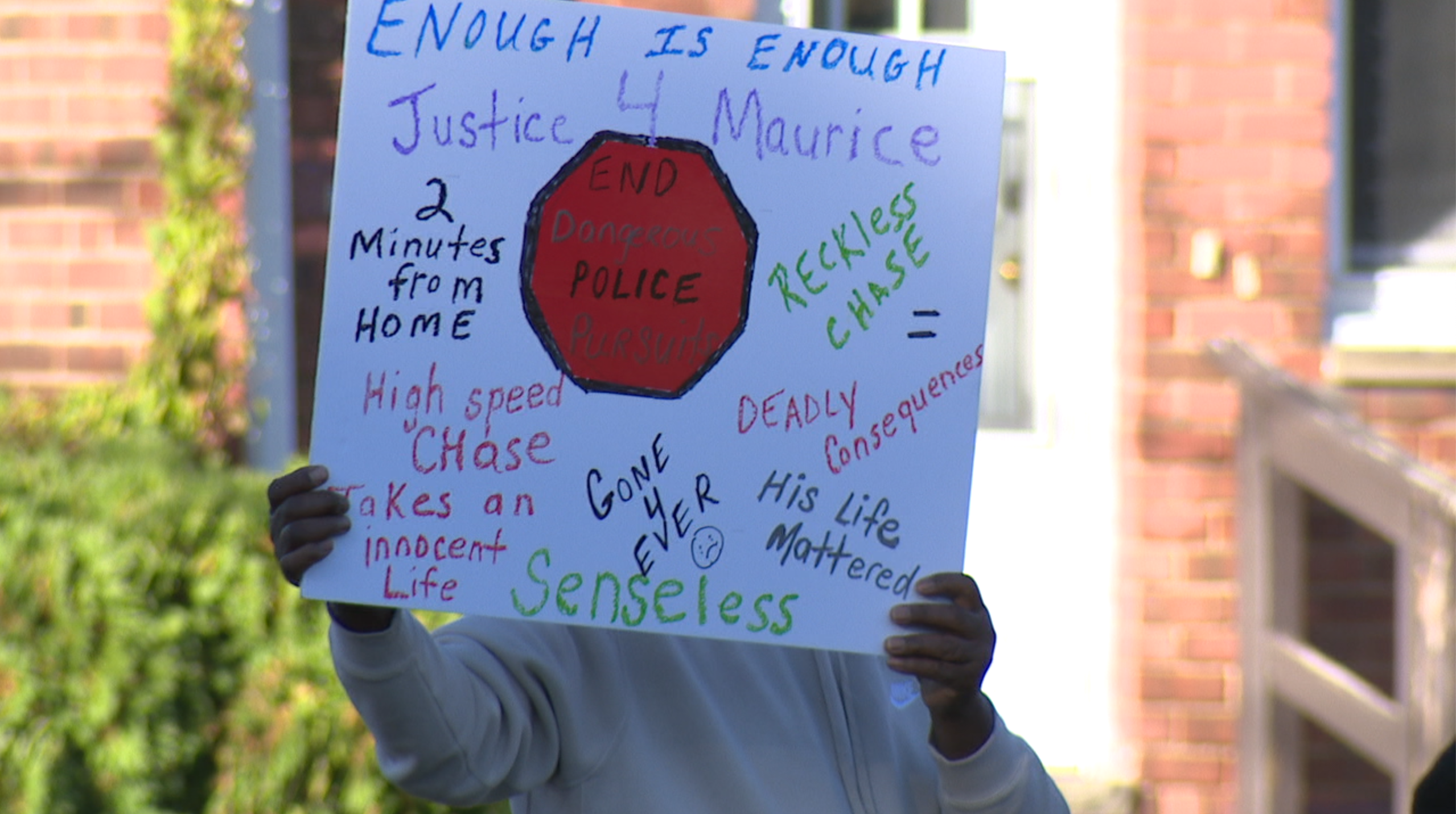 Call for action outside of Euclid Police Department on October 9
