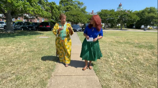 wanda tucker and jessica larche walking on site of the future African Landing Memorial.png