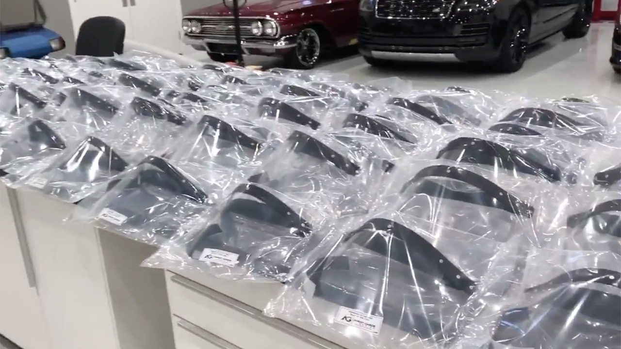 Avant-Garde Designs in Palm City works on high end cars, but now they are making thousands of face shields. 