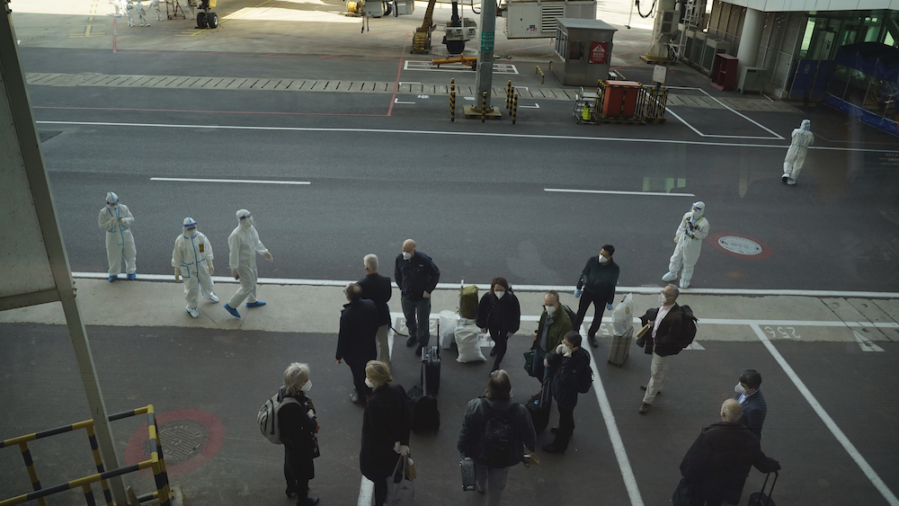 Virus Outbreak China Investigators