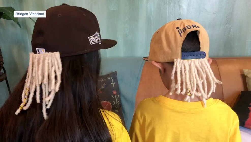 Tatis Jr. fan makes clip-on dredlocks.png