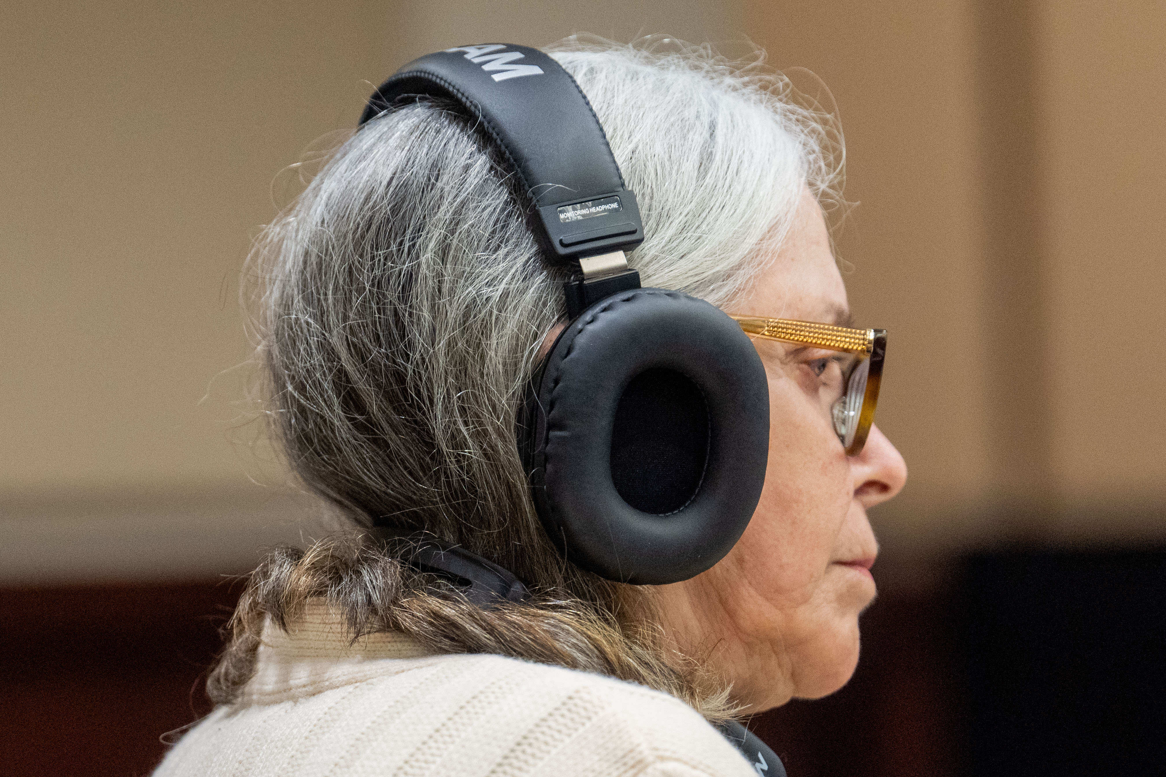 Donna Adelson listening to wire taps during day 8 of her trial  