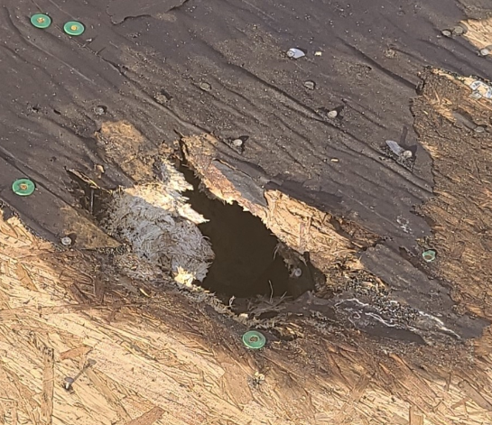 Ark roofing damage from storm.PNG