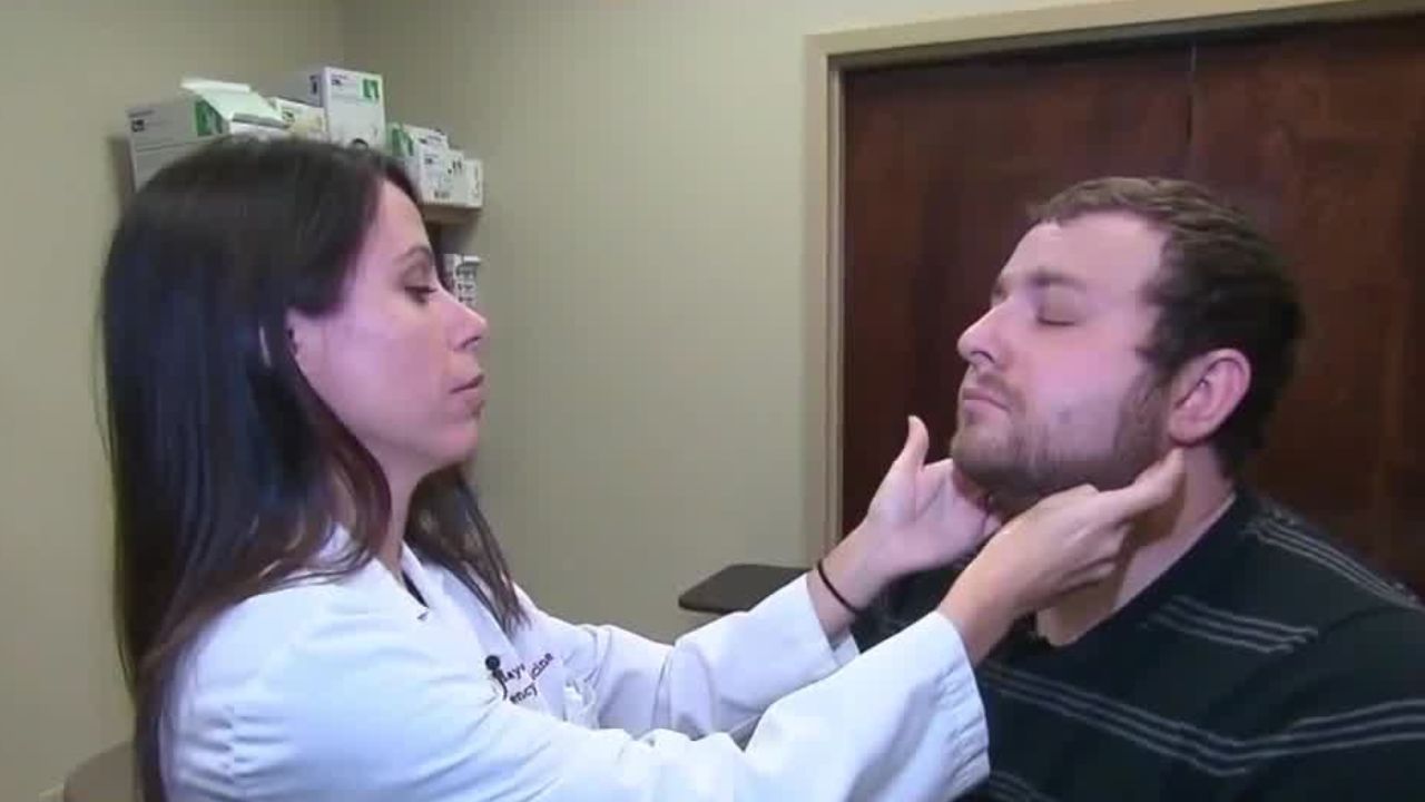Doctor checks patient
