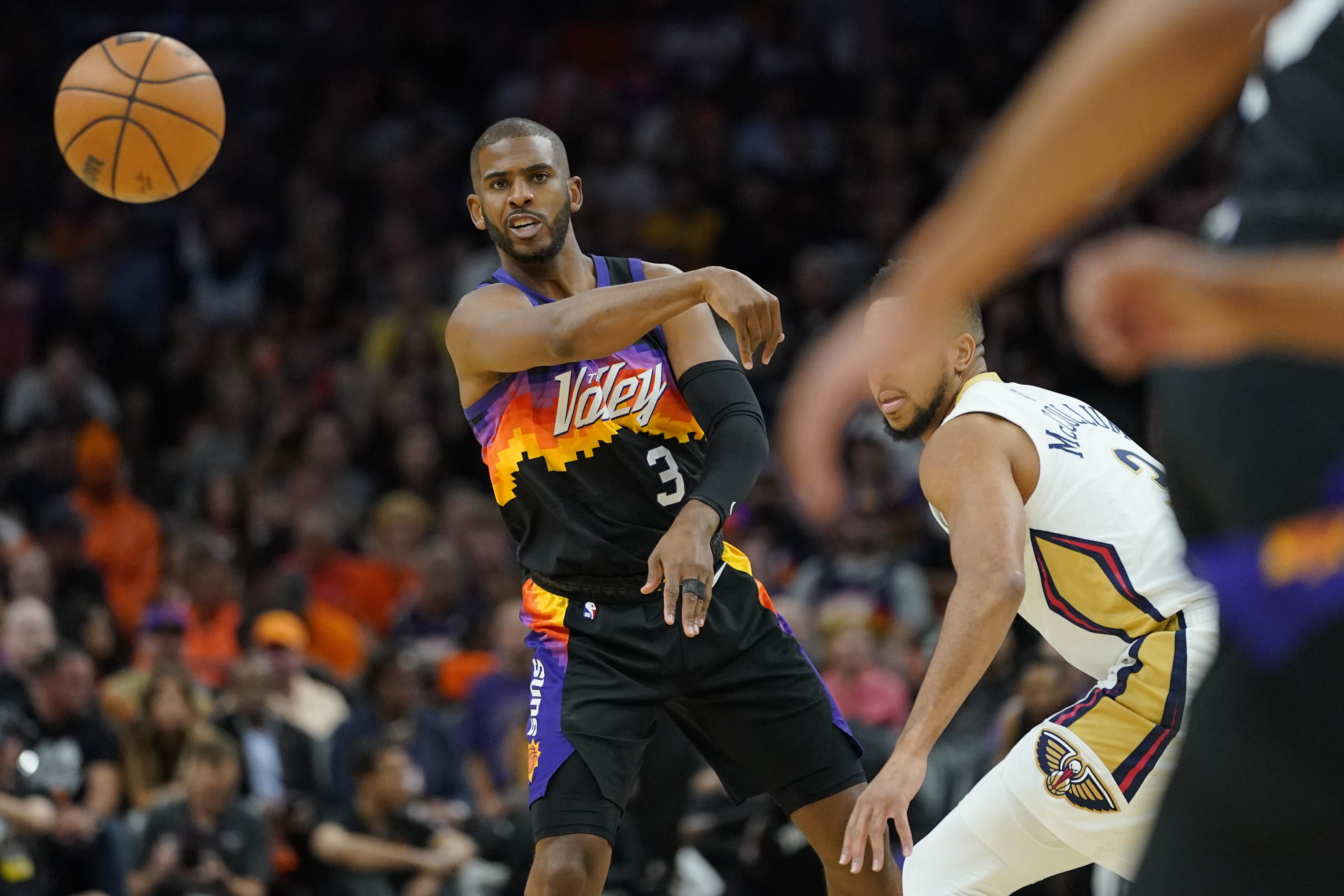 Phoenix Suns guard Chris Paul (3) passes against the New Orleans Pelicans during the first half of Game 5 of an NBA basketball first-round playoff series, Tuesday, April 26, 2022, in Phoenix. (AP Photo/Matt York)

