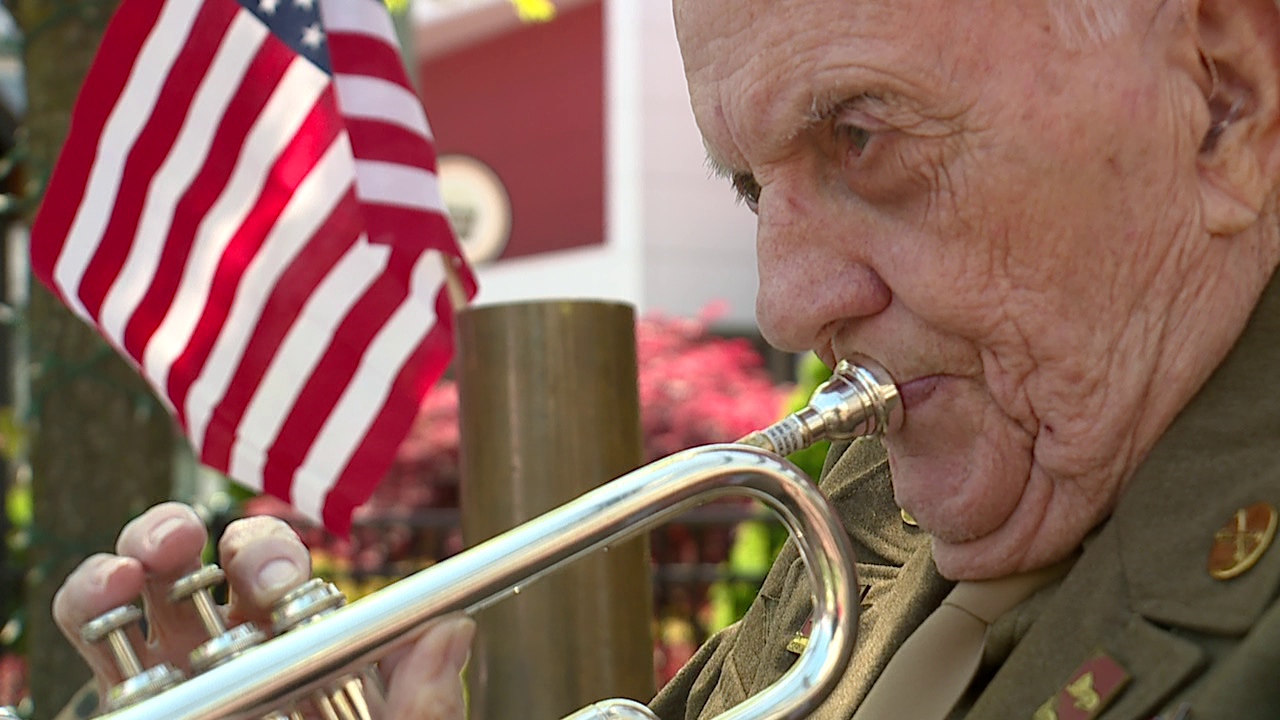 Stewart Boone playing his trumpet.png