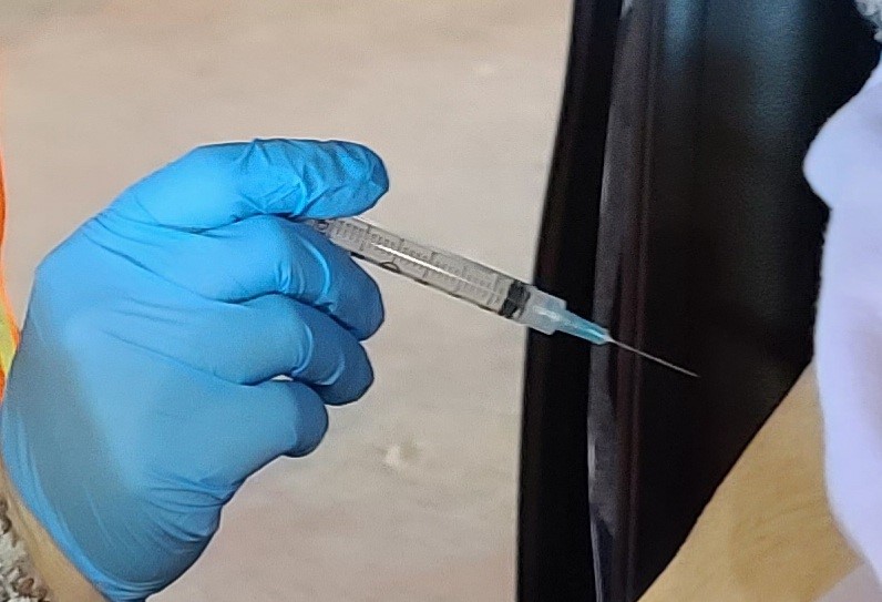 Empty vaccine syringe