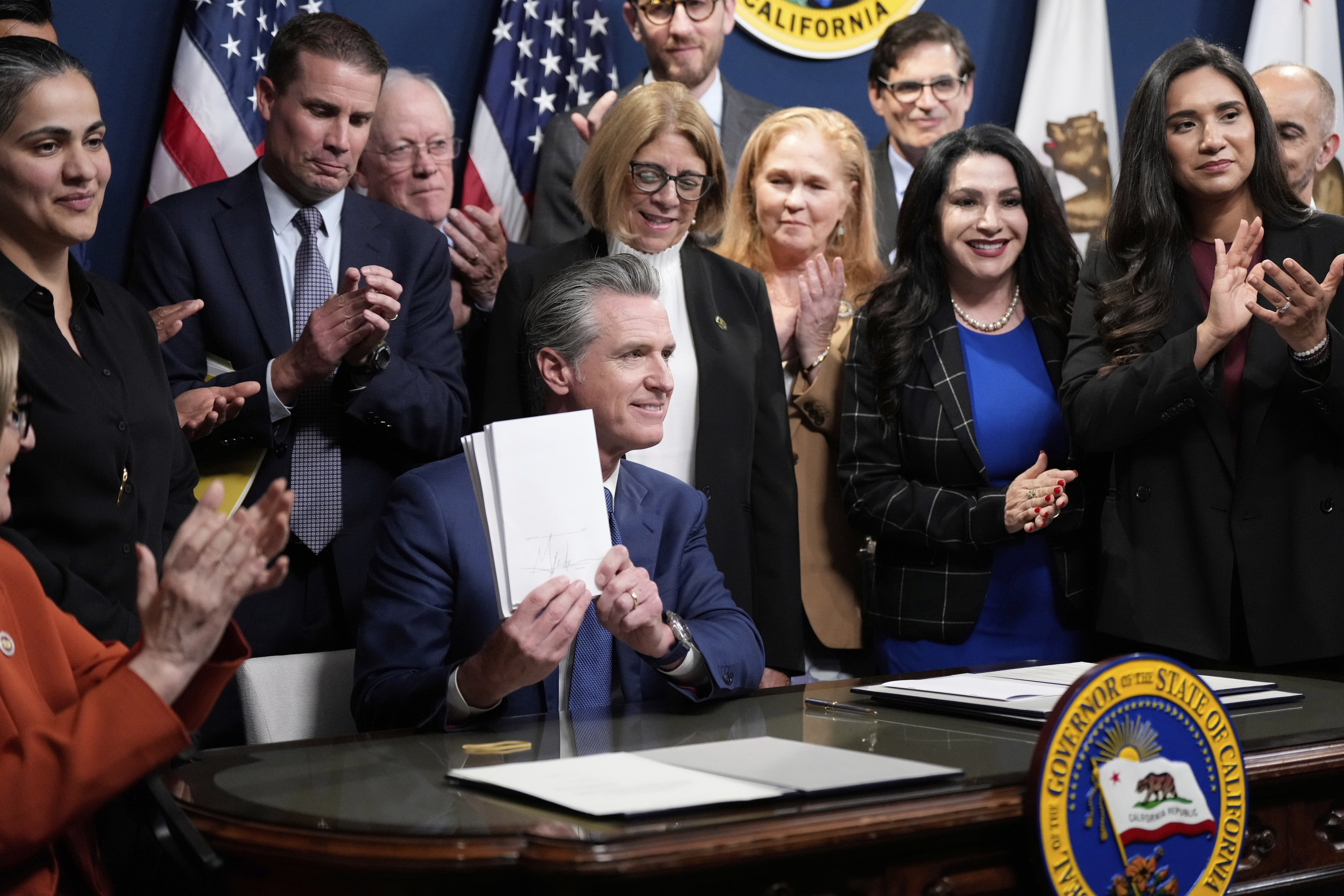 California Gov. Gavin Newsom signs legislation calling for a special election on a redrawn congressional map on Thursday, Aug. 21, 2025, in Sacramento, Calif. 