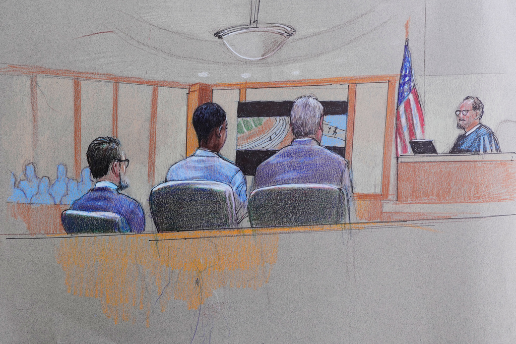 A courtroom sketch provided by Pat Lopez shows Karmelo Anthony, center, at the defense table, the jury on the left and the presiding judge on the right, June 4, 2026, in McKinney, Texas, during the trial of a teen accused of fatally stabbing another during a track meet in suburban Dallas last year. 