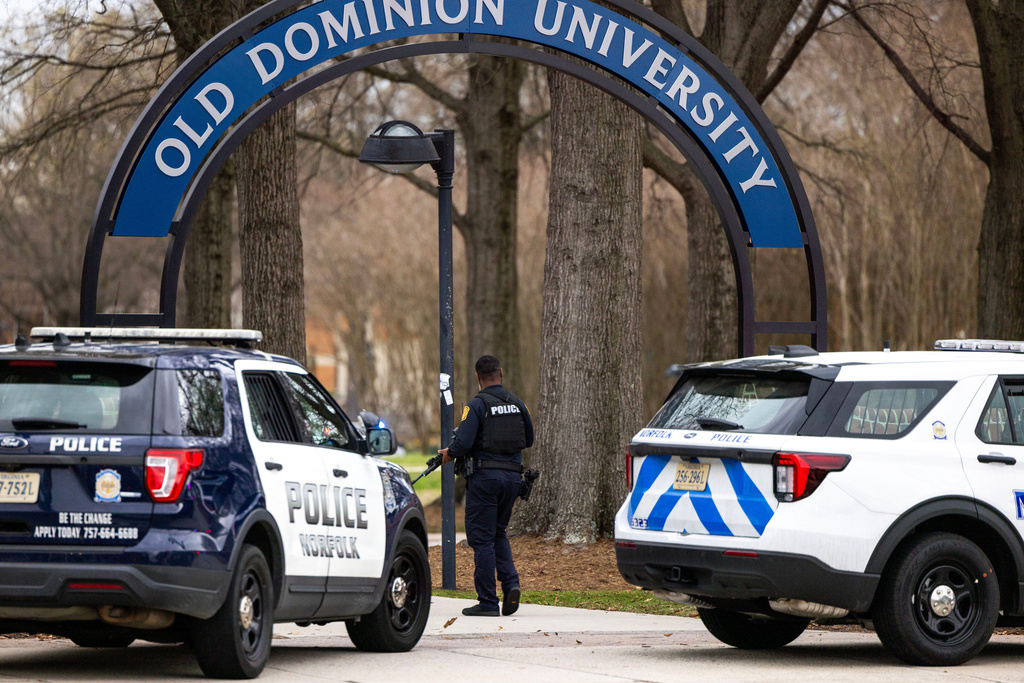 Police arrive outside  Old Dominion University's campus after reports of an active shooter on Thursday, March 12, 2026 in Norfolk, Va.