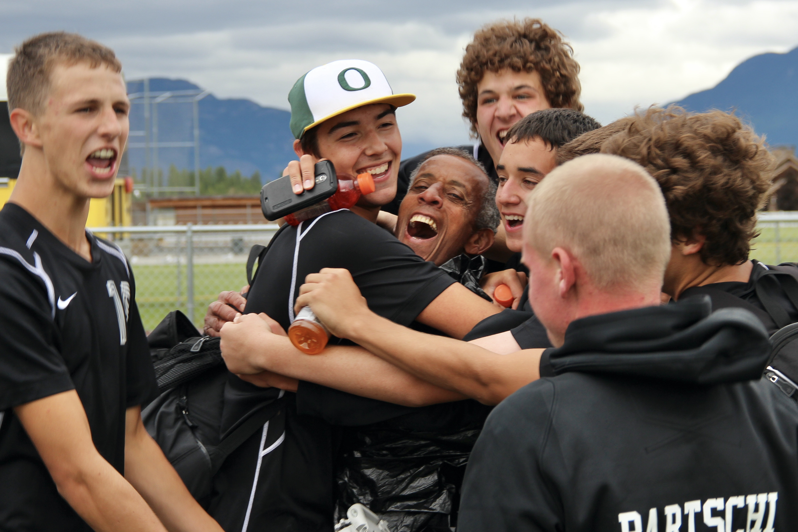 Ralph Serrette celebrating with his team, Stevensville