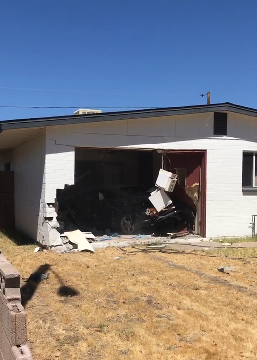Car into home near 21st and Sunnyside avenues 