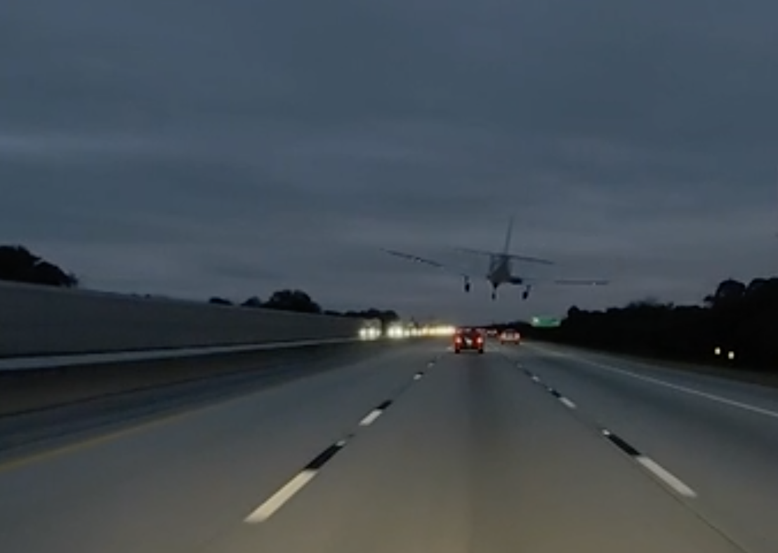 Plane landing on highway