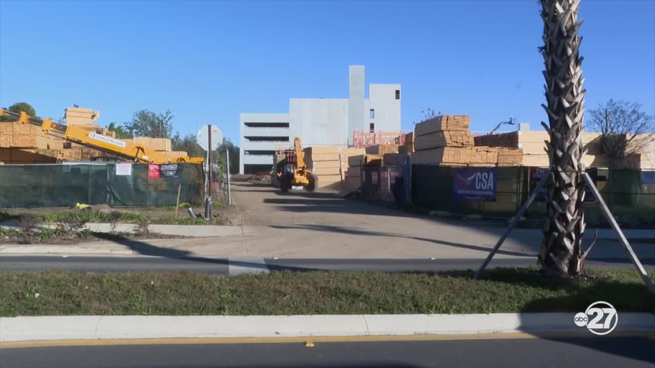 Progress is finally being made on a long-delayed Construction project at 1021 Railroad Avenue. Local business owners hope it will boost the art district.