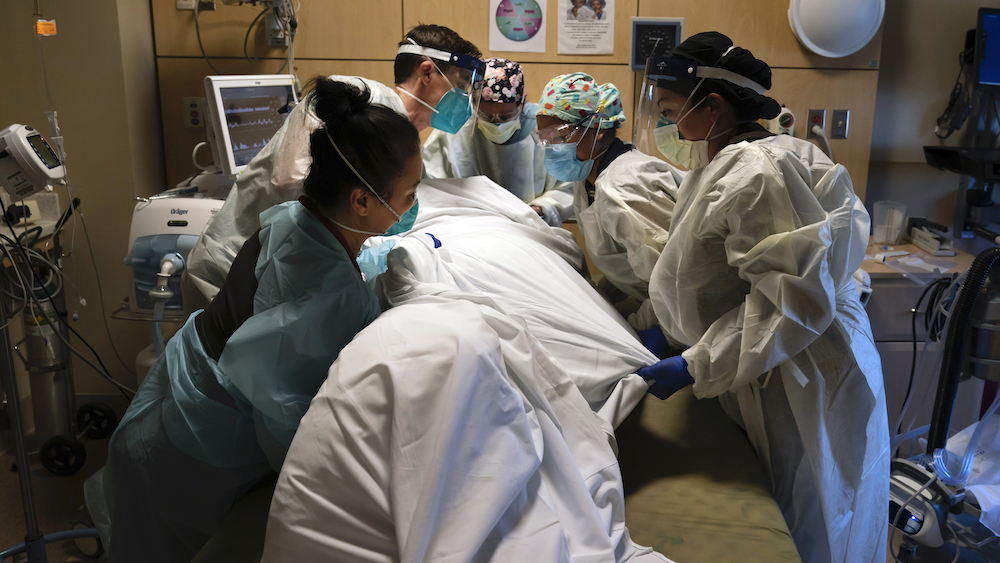 Virus Outbreak US Surge