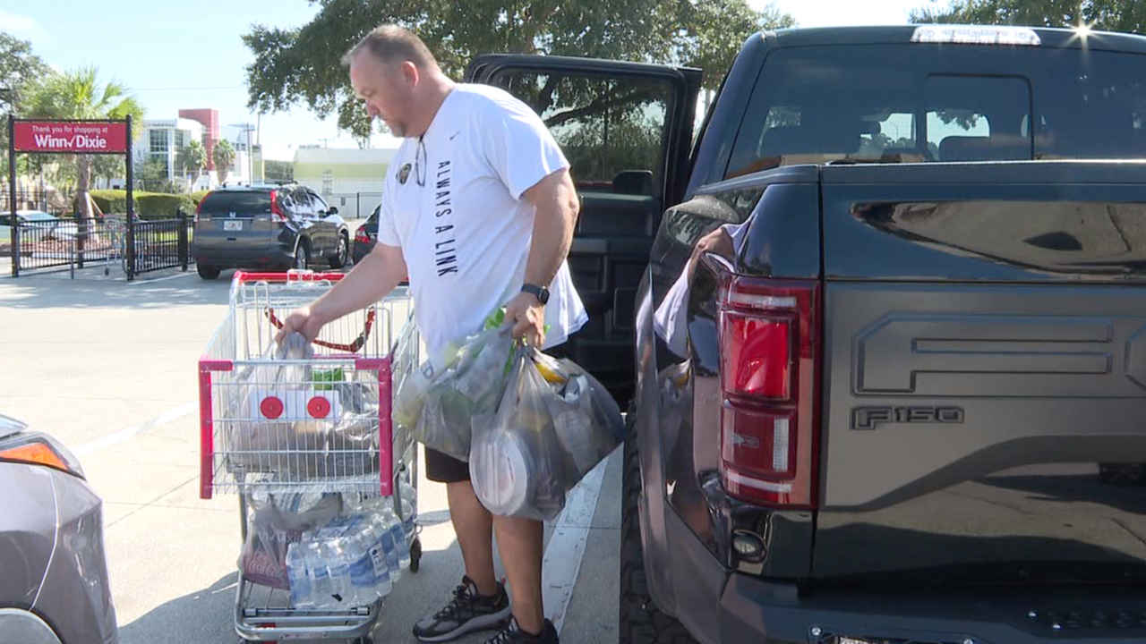 Residents flock to stores, stocking up on last-minute items