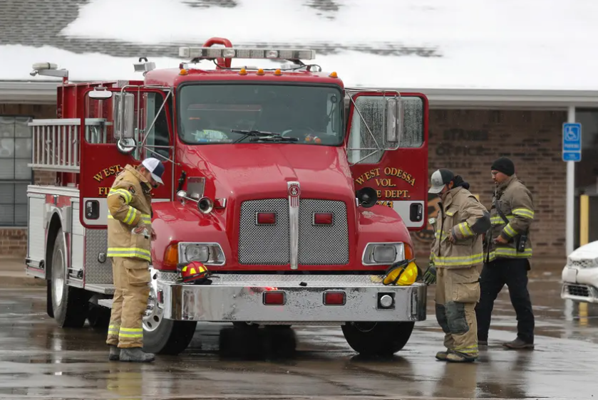 Members of the West Odessa Volunteer Fire Department ready their equipment in Fritch, TX on Feb. 29, 2023. Residents have been working to recover from the Tuesday grass fires that devastated parts of the panhandle.