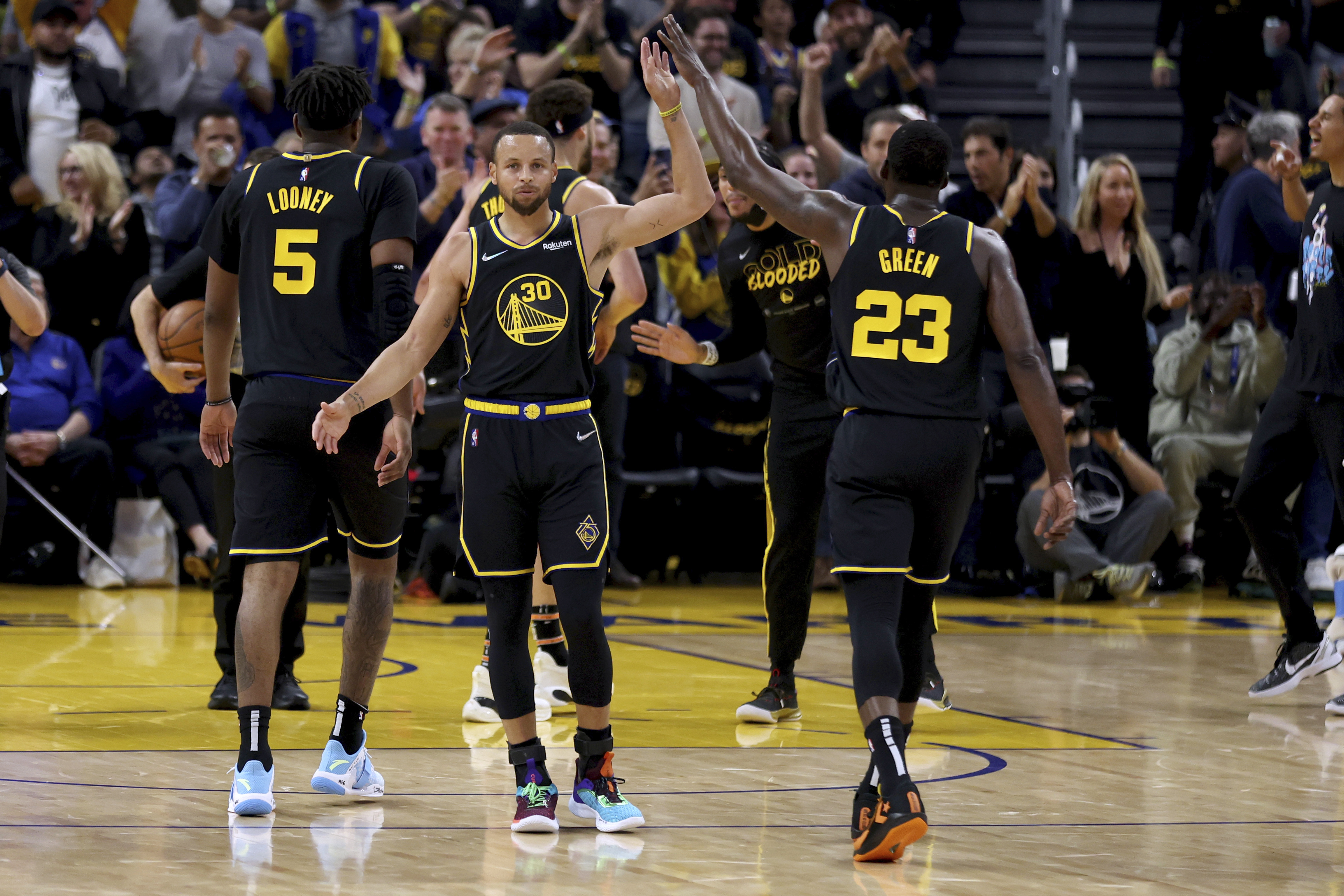 Curry, Warriors Hold off Jokic, Eliminate Nuggets in Game 5