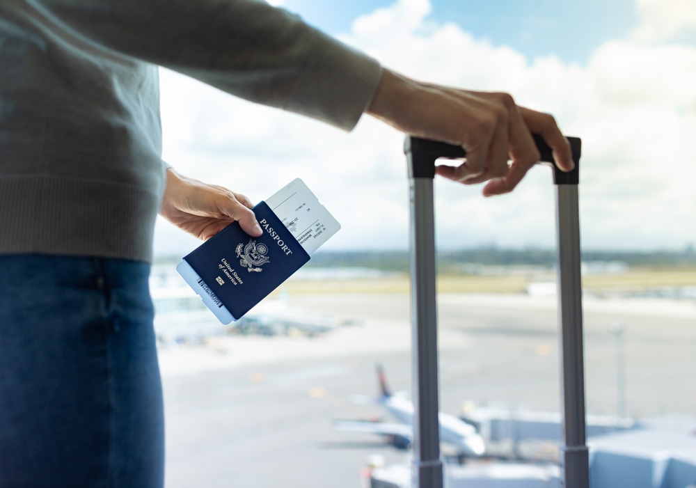 Traveler,At,Airport,,Us,Passport,Holder,Traveling,By,Plane