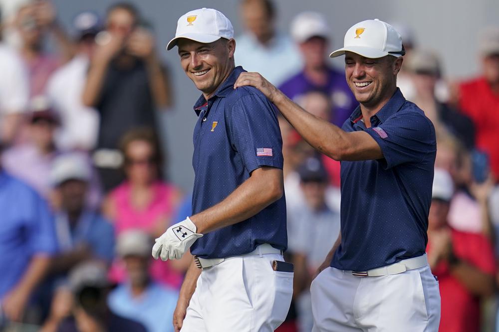 Jordan Spieth, left, and Justin Thomas