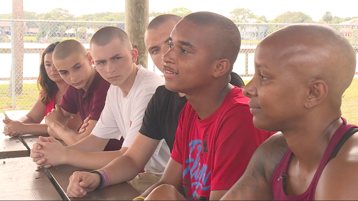 Teens shave their heads in solidarity with a friend's mother battling cancer.