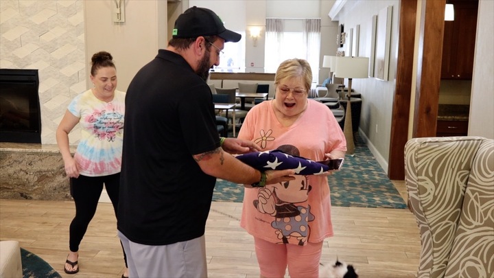 "It looks wonderful": Widow gets father's burial flag back after flooding