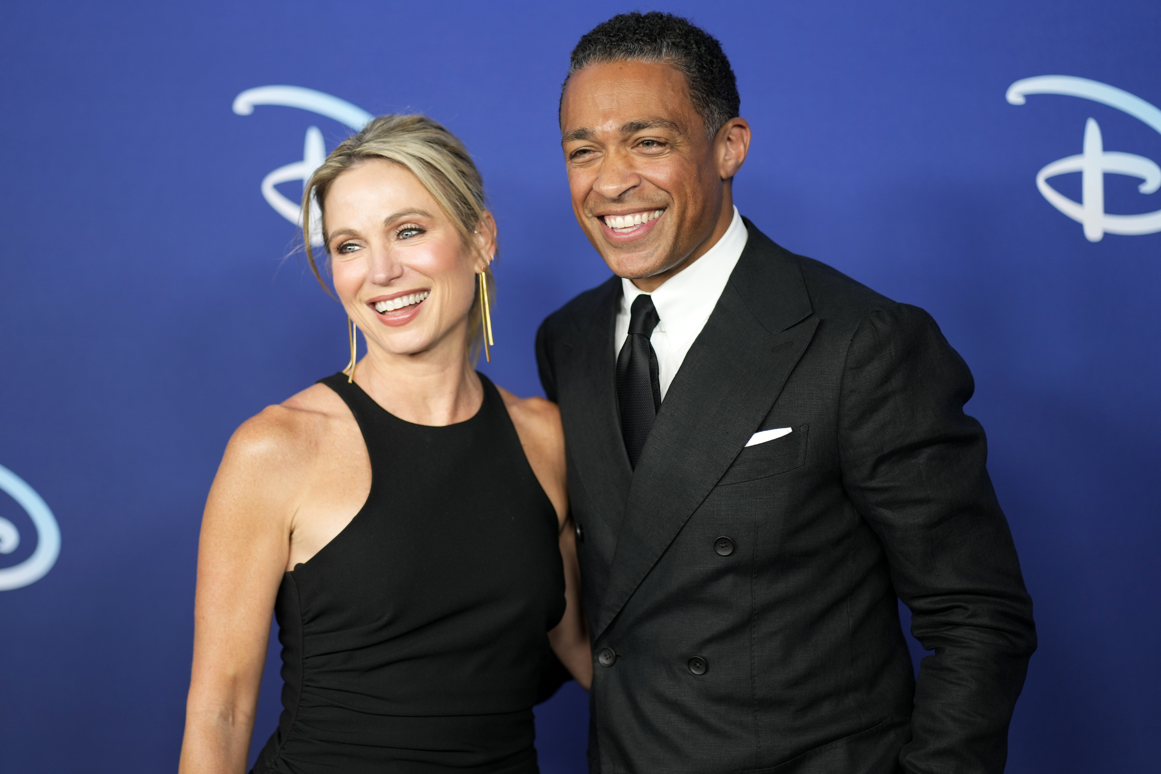 T. J. Holmes, Amy Robach