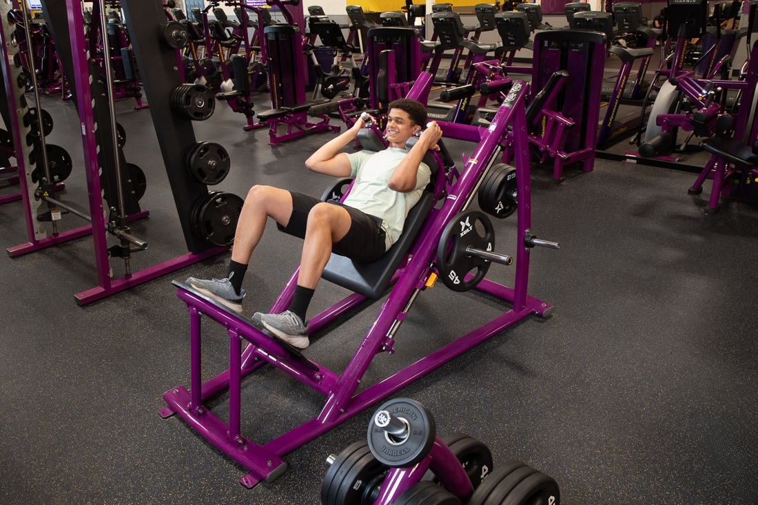 Teen on Plate Load Leg Press