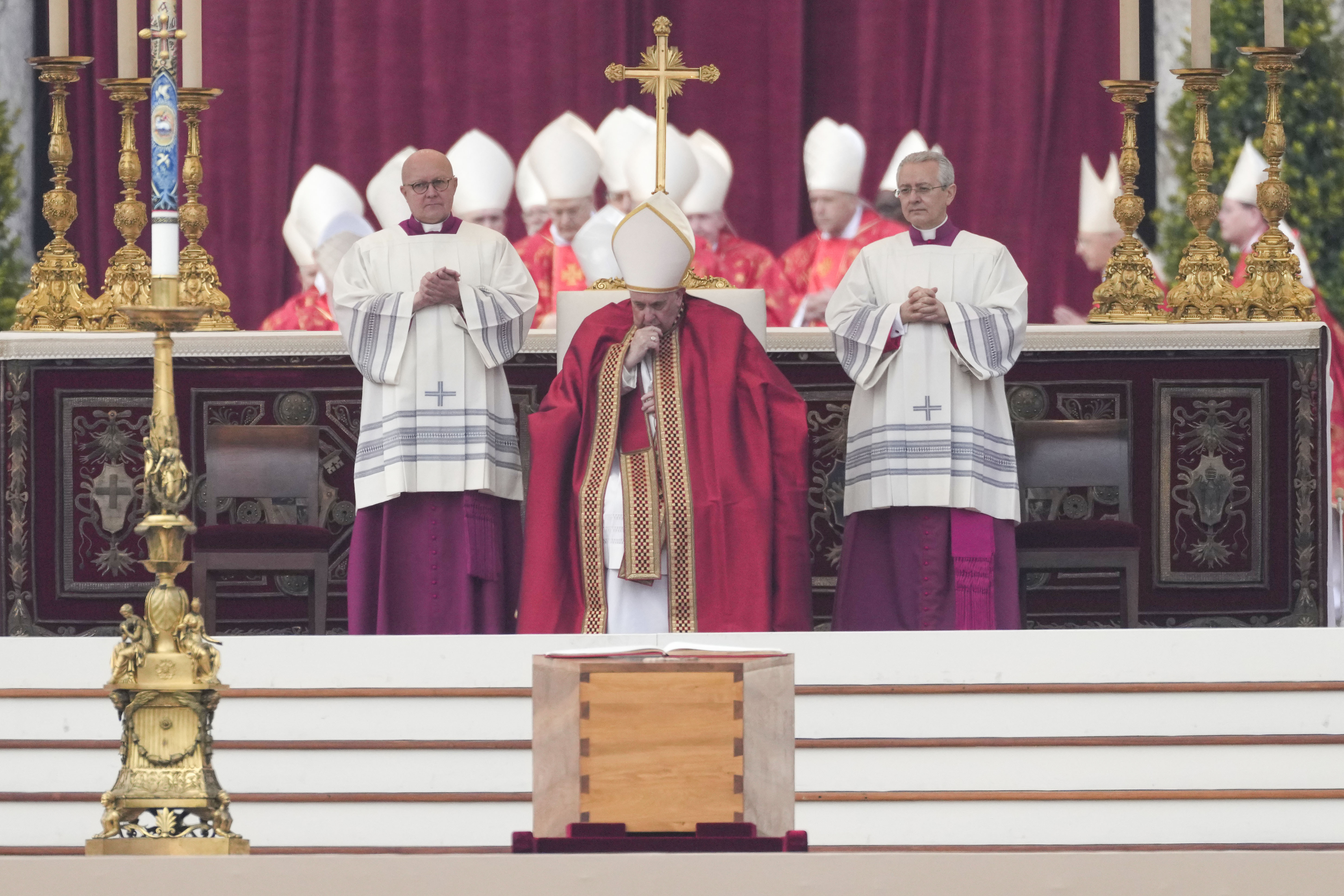 Pope Francis sits by coffin of Benedict XVI at Vatican, Jan. 5, 2022